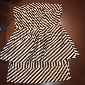 A black and cream stripped tight fitted dress